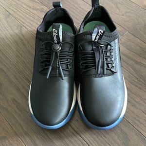 Cloves black sneakers with blue bottoms